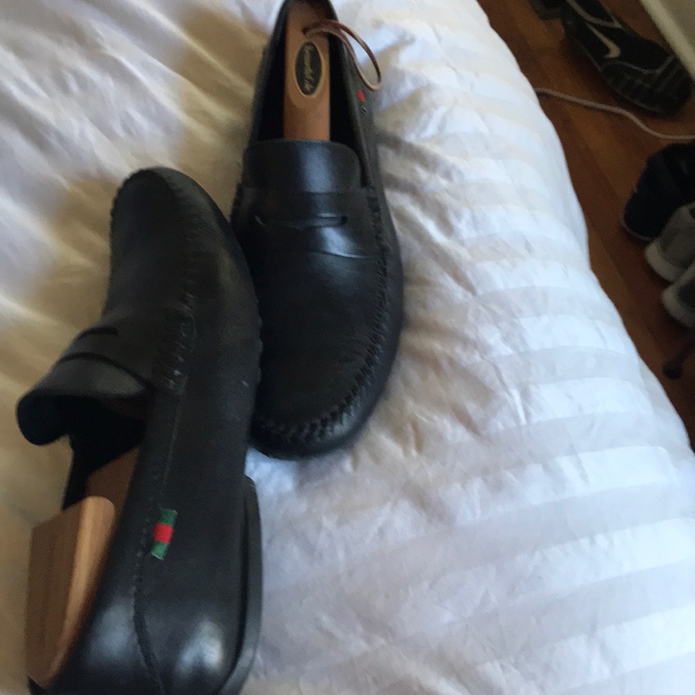 Black Gucci loafers